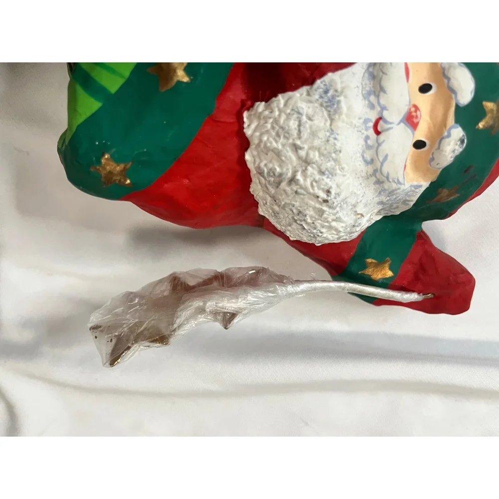 Paper‎ mache Flying Santa with gold stars